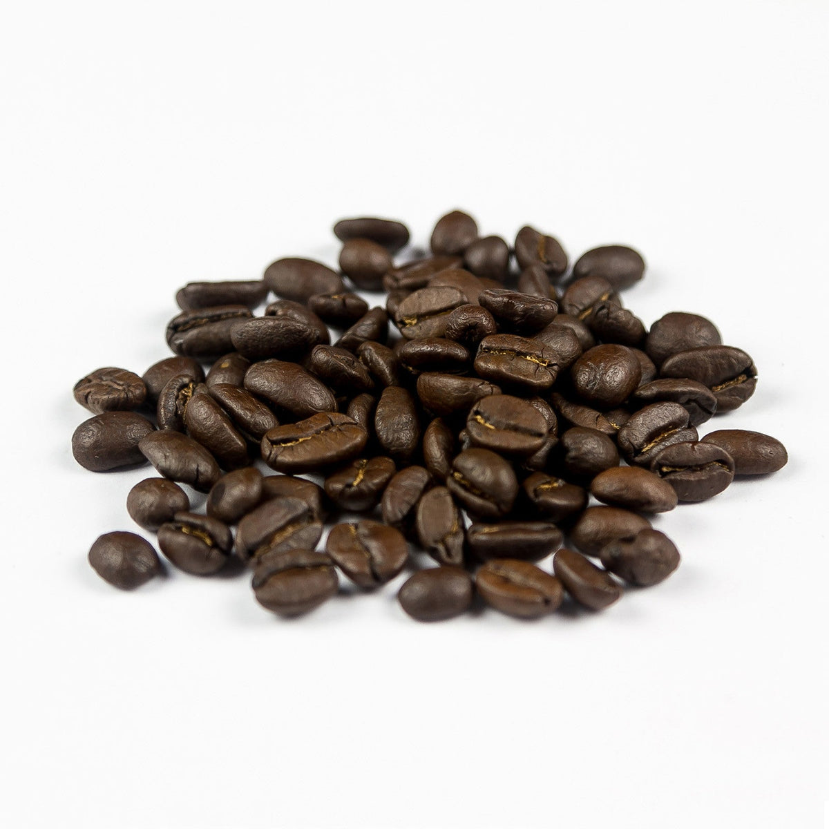Colombia Huila dark roast speciality coffee beans close up – oily surface and deep roast