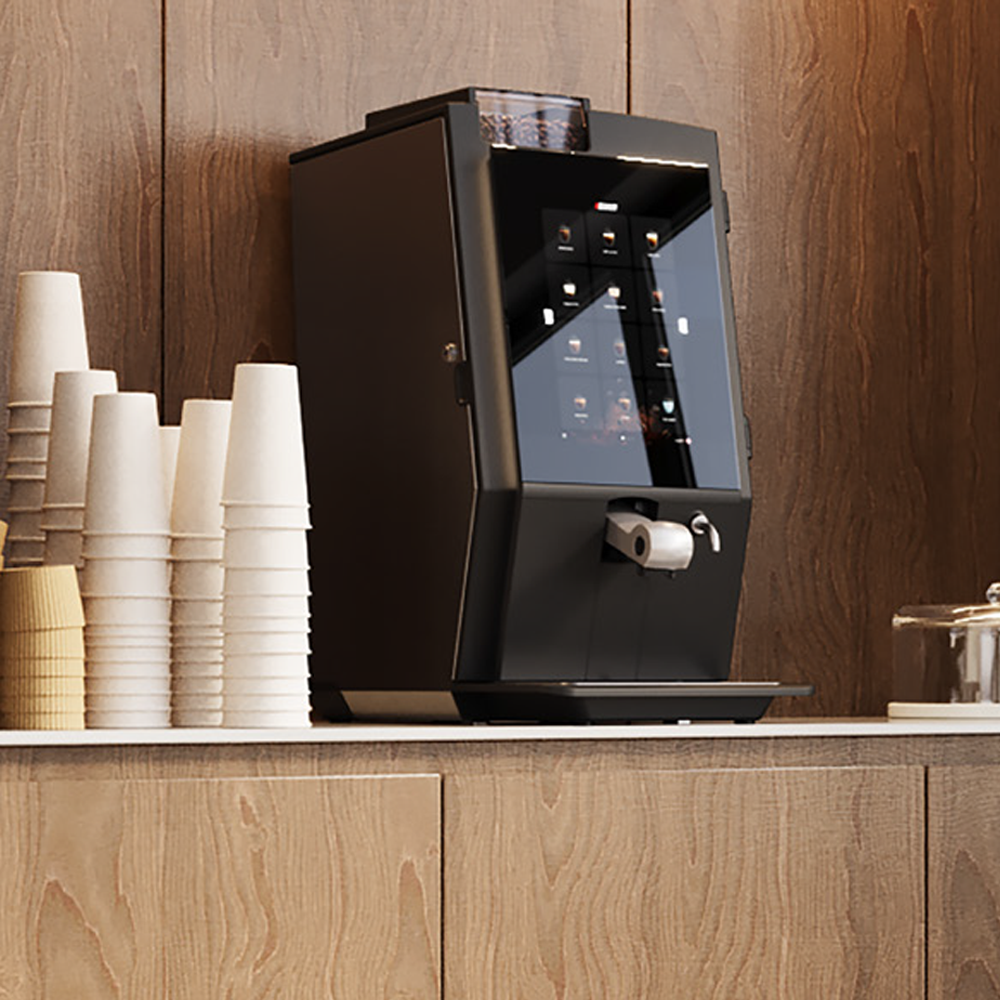 Bravilor Esprecious 12 Bean-to-Cup Coffee Machine – sleek design with intuitive touchscreen, dual canisters for coffee beans and instant ingredients, automatic rinsing program, and up to 120 cups per day capacity. Ideal for high-demand environments.