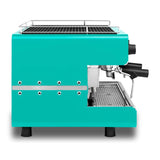Turquoise espresso machine on a white background