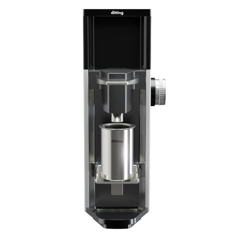 Black and silver coffee machine on a white background