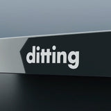 Close-up of a black and gray product with 'ditting' branding.