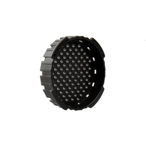 Black circular object with textured surface on a white background
