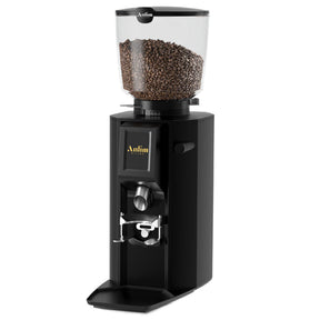 Black coffee grinder with coffee beans on a white background
