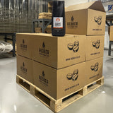 Stack of cardboard boxes with Redber Coffee Roasters branding in a warehouse setting.