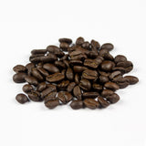 Colombia Huila dark roast speciality coffee beans close up – oily surface and deep roast