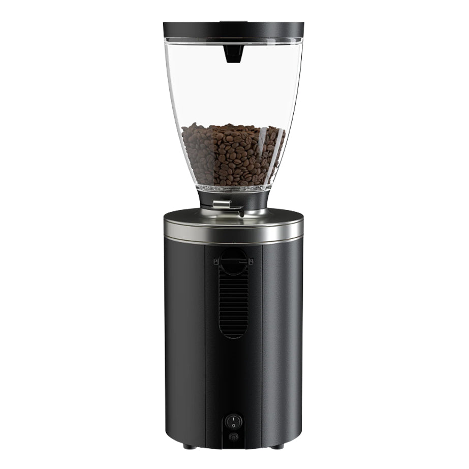 Black coffee grinder with clear container of coffee beans on a white background
