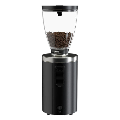 Black coffee grinder with clear container of coffee beans on a white background