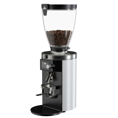 Coffee grinder with clear container showing coffee beans on a white background