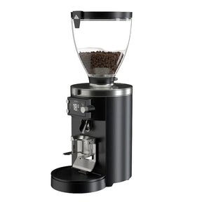 Black coffee grinder with clear container showing coffee beans on a white background