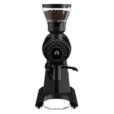 Black coffee grinder with a clear container of coffee beans on a white background