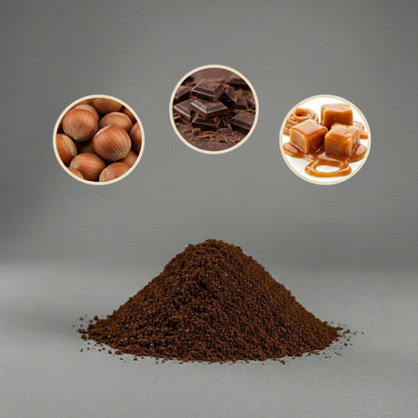 Heap of ground coffee with close-ups of hazelnuts, chocolate, and caramel on a gray background