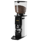 Coffee grinder with coffee beans on a white background