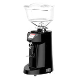 Black coffee grinder with clear glass container on a white background