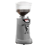 Gray coffee grinder with clear container on a white background