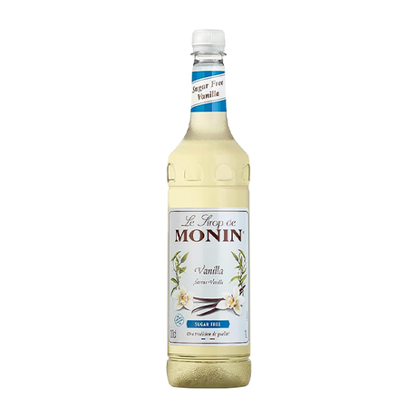 A bottle of Monin Vanilla Syrup 1L with a label indicating it is sugar free  flavored syrup.