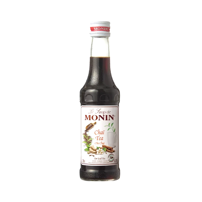 Bottle of Monin Chai Tea syrup on a white background