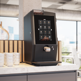 Bravilor Esprecious 12 Bean-to-Cup Coffee Machine – sleek design with intuitive touchscreen, dual canisters for coffee beans and instant ingredients, automatic rinsing program, and up to 120 cups per day capacity. Ideal for high-demand environments.