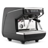 Black espresso machine with silver accents on a white background