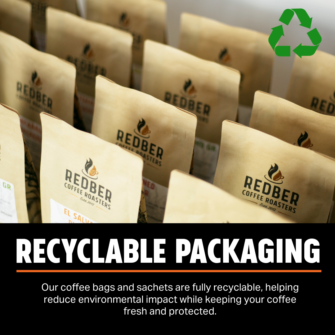 Coffee bags with Redber Coffee Roasters branding and recyclable packaging label.