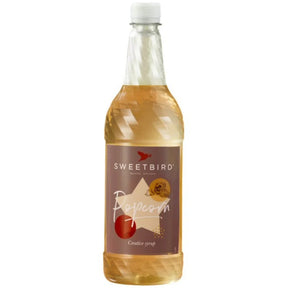 Bottle of Sweetbird Popcorn syrup on a white background