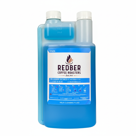 Blue bottle of Redber Coffee Roasters milk cleaning fluid on a white background