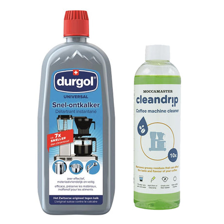 Two bottles of Moccamaster coffee machine cleaning products, one labeled as Durgol Universal Descaler and the other as Cleandrip Cleaning Aid.