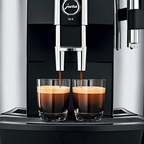 Jura WE8 Bean-to-Cup Coffee Machine with one-touch operation, 12 programmable drink options, and Pulse Extraction Process (P.E.P.), ideal for small offices and self-service areas I Redber Coffee